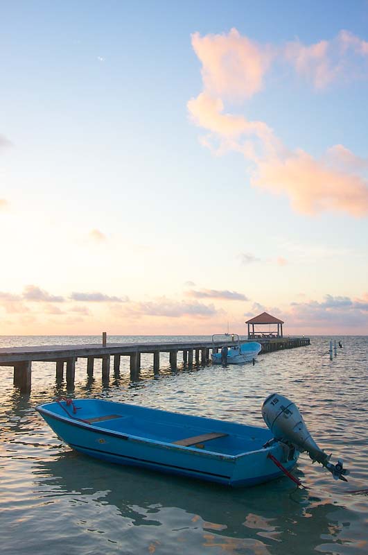 Boat at sunrise, Caribbean Villas